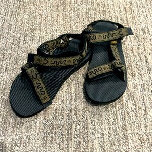 Never worn Teva Sandals 
Unisex